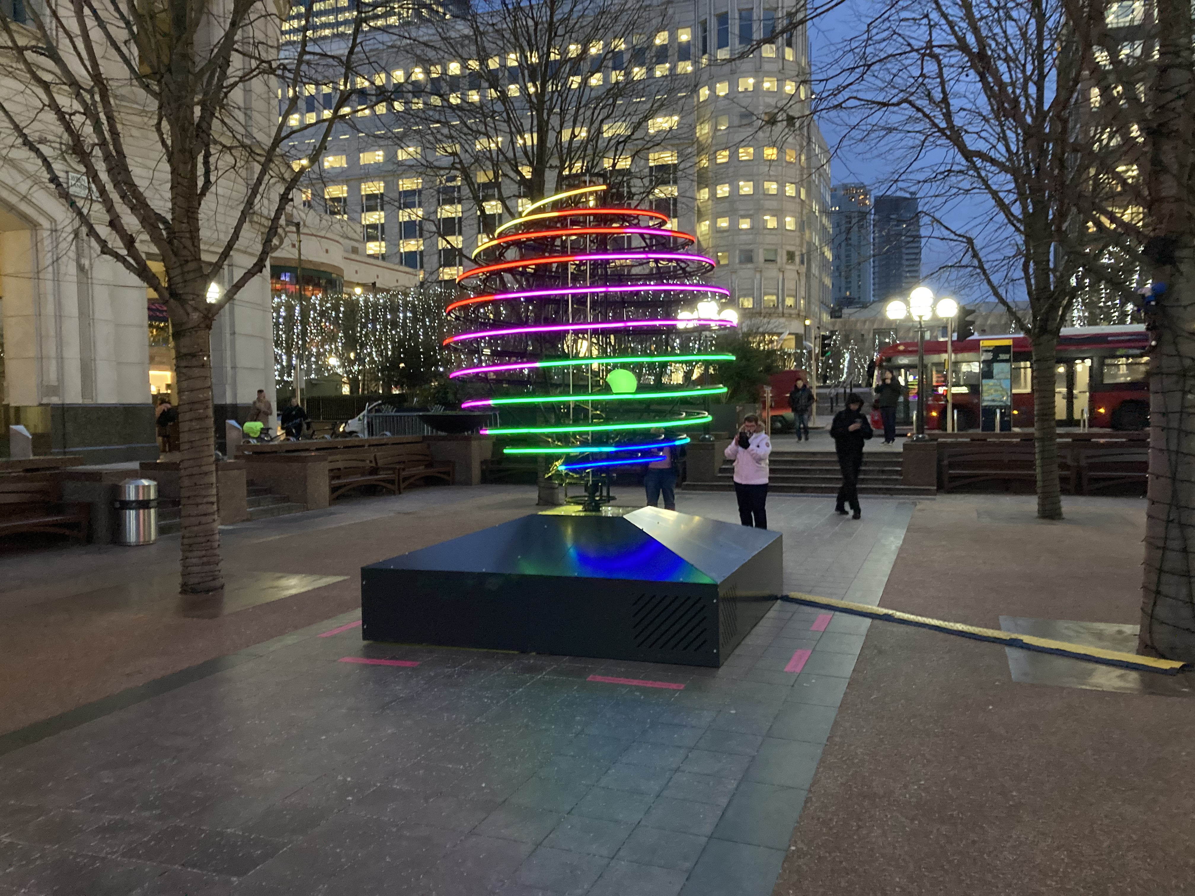 Marbles — Canary Wharf plaza at dusk